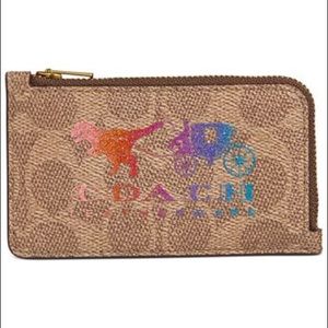 COACH's Signature Rexy and Carriage card case